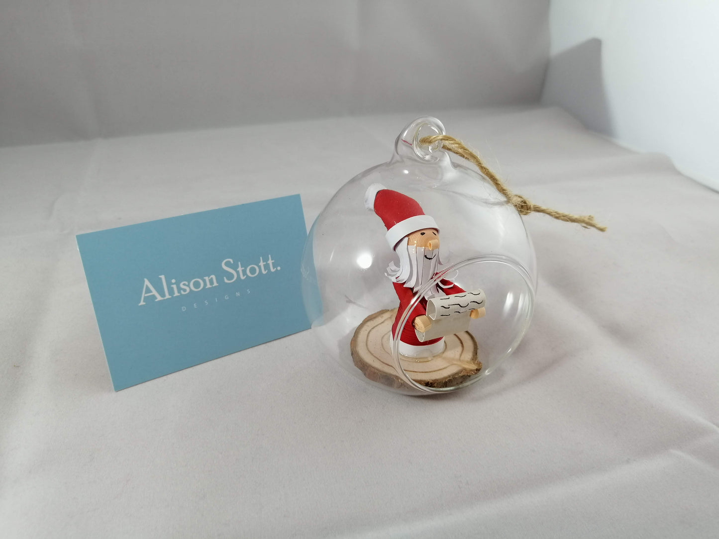 Santa checking his list Bauble