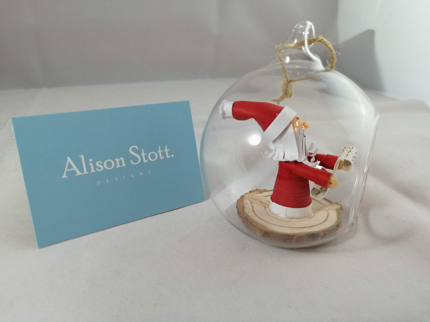 Santa checking his list Bauble