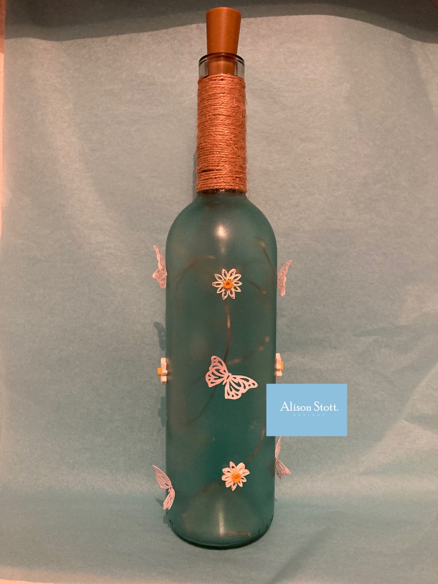 Light up  bottle with daisies and butterflies